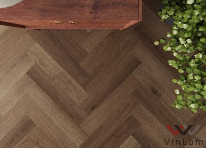 Фото №1 - Виниловое покрытие Invictus MAXIMUS DRYBACK HERRINGBONE Highland Oak Parquet Chocolate - 42